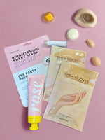 Skincare products including a sheet mask, lip balm, and shea gloves 